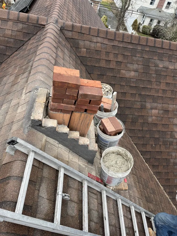 Slide of EA Chimney & Roofing