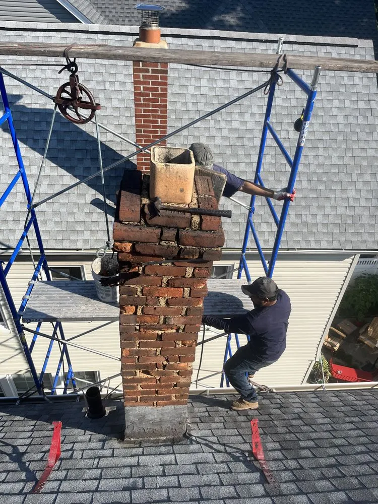 Slide of EA Chimney & Roofing