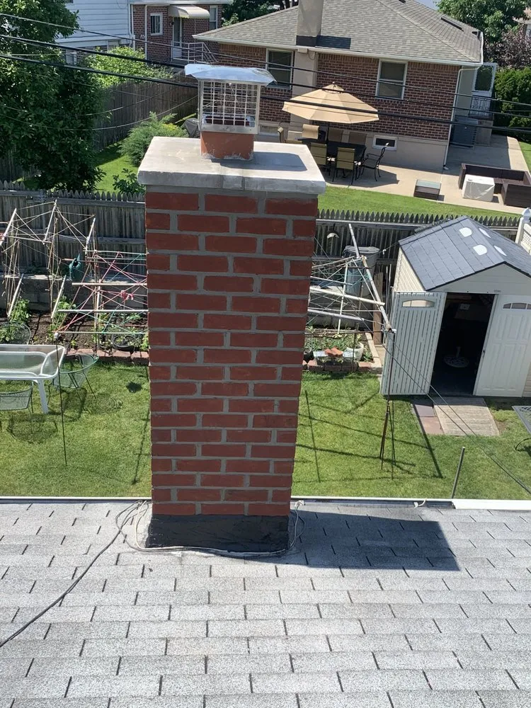 Slide of EA Chimney & Roofing