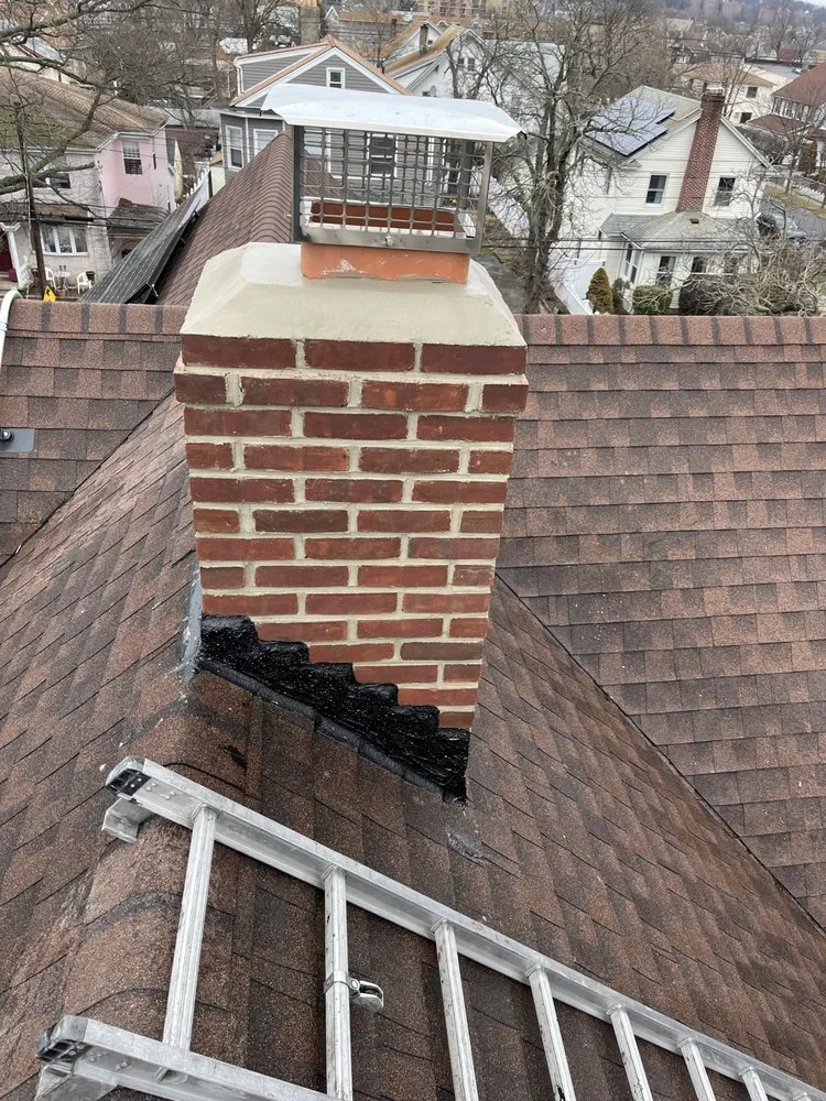 Slide of EA Chimney & Roofing