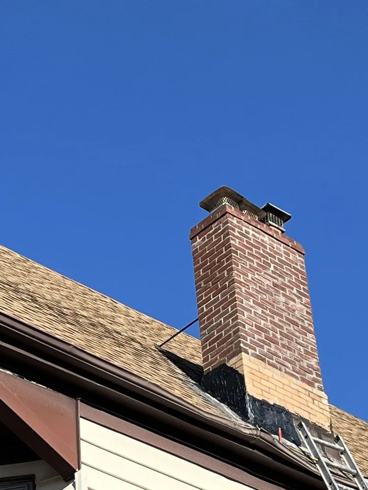 Slide of EA Chimney & Roofing