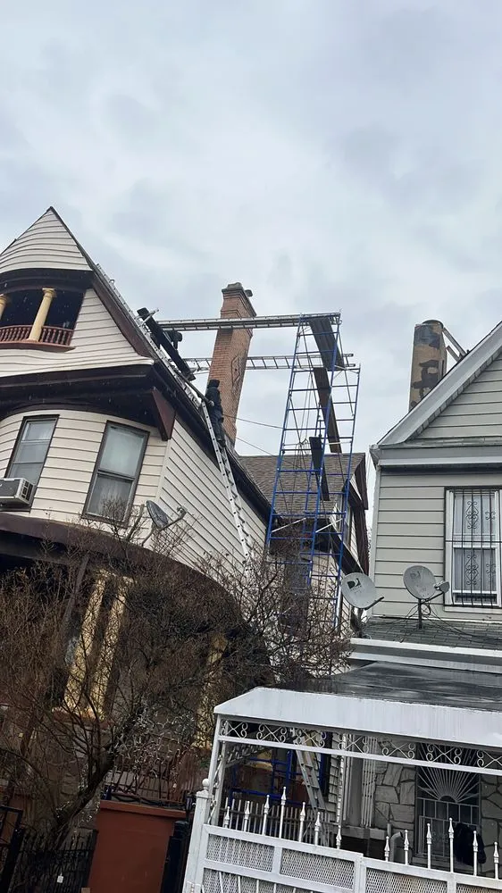 Slide of EA Chimney & Roofing