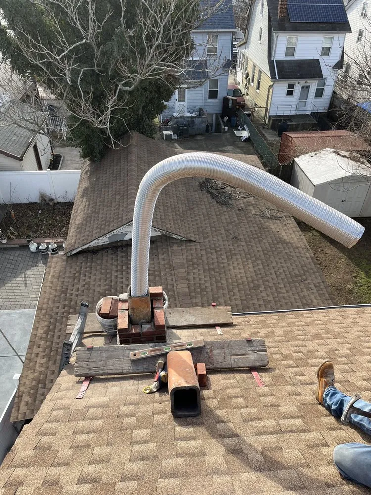 Slide of EA Chimney & Roofing