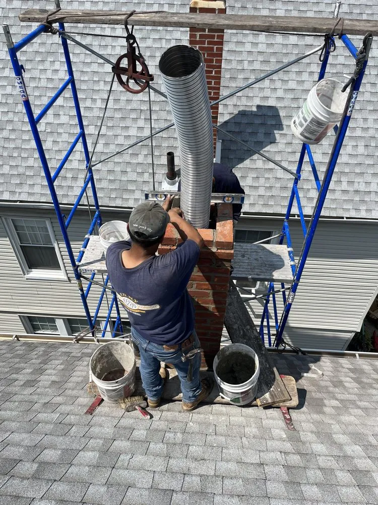 Slide of EA Chimney & Roofing