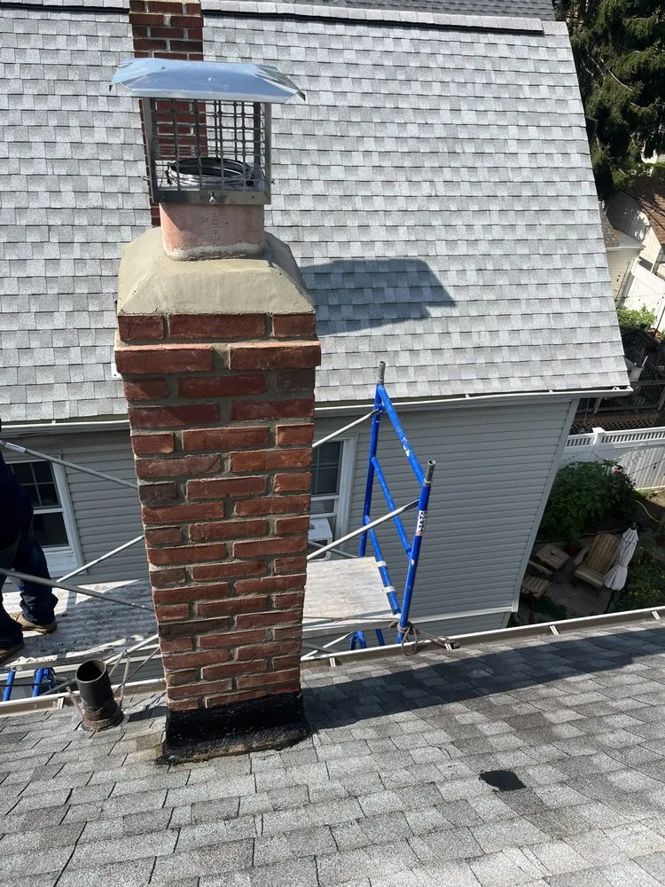 Slide of EA Chimney & Roofing