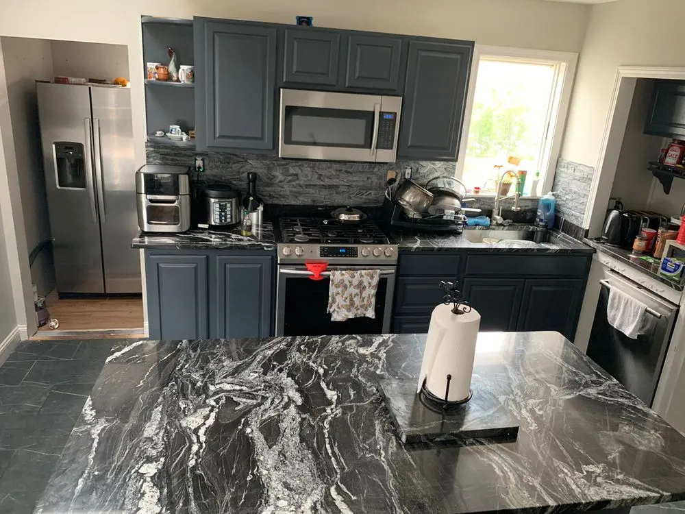 Slide of Eagle Painting & Construction