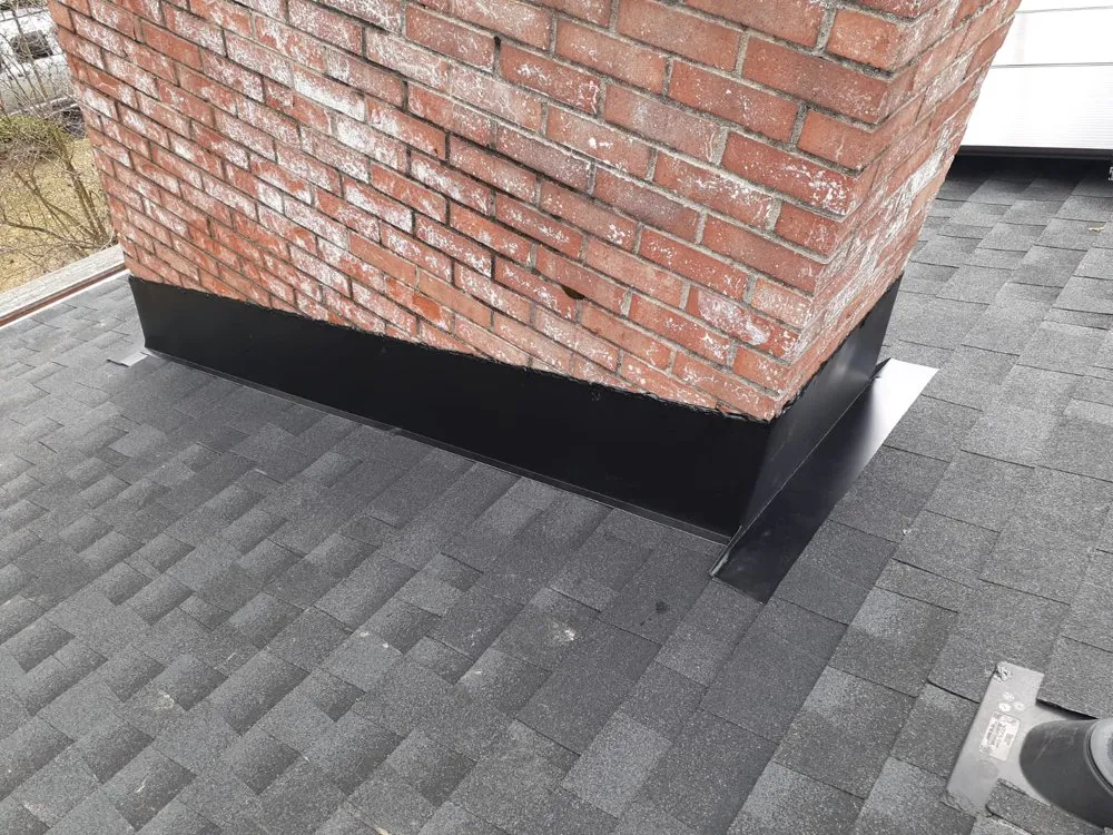 Professional shingle roofing service after storm damage in Chesterfield, VA by Eagle Roofing and Wall Systems