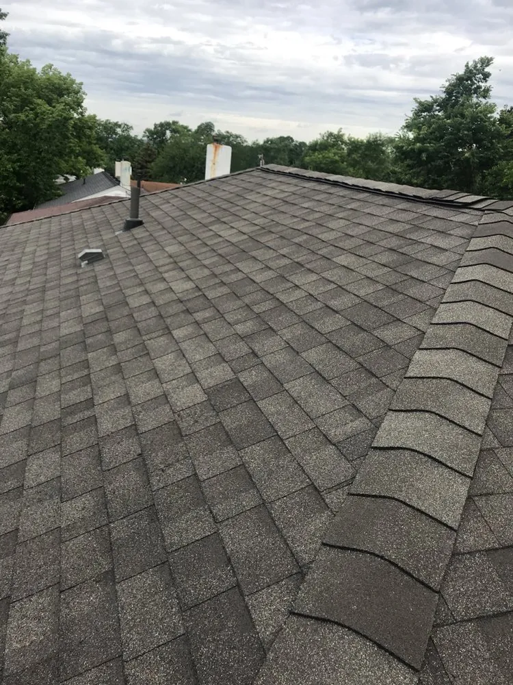 Slide of Eagleye Roofing