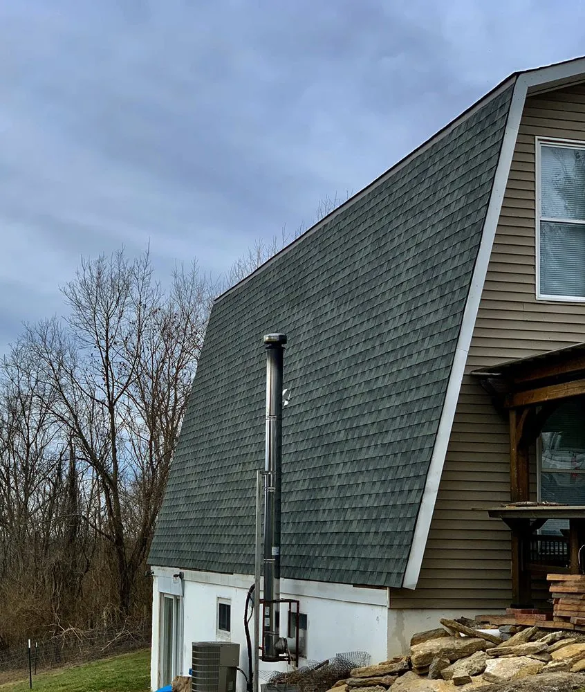 Slide of Eagleye Roofing