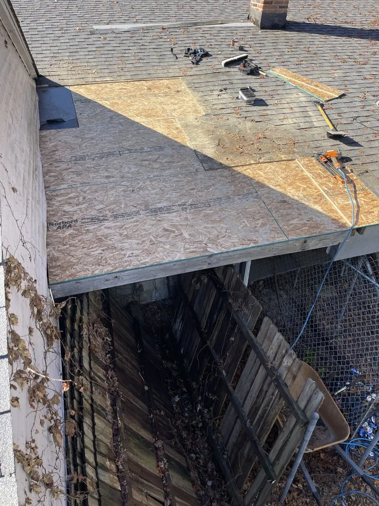 Slide of Eames and Sons Roofing