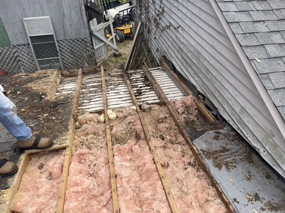 Slide of Eames and Sons Roofing