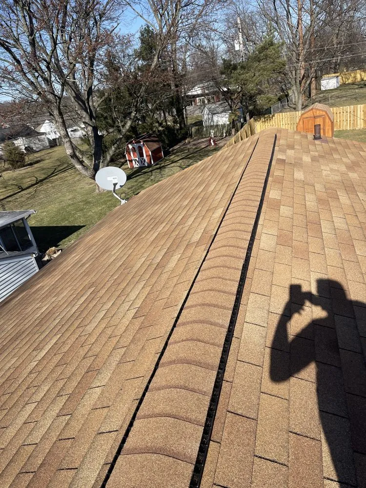 Slide of Eames and Sons Roofing