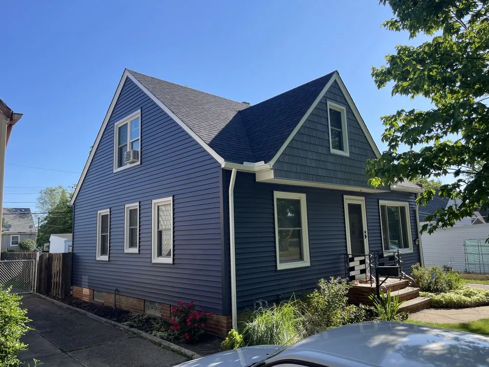 Slide of Eames and Sons Roofing