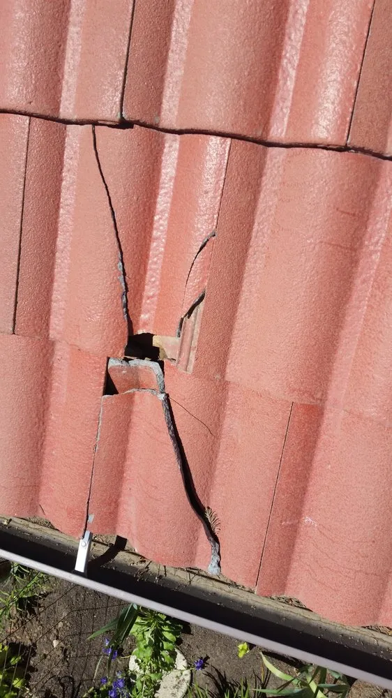 Slide of Earl Bennett Roofing