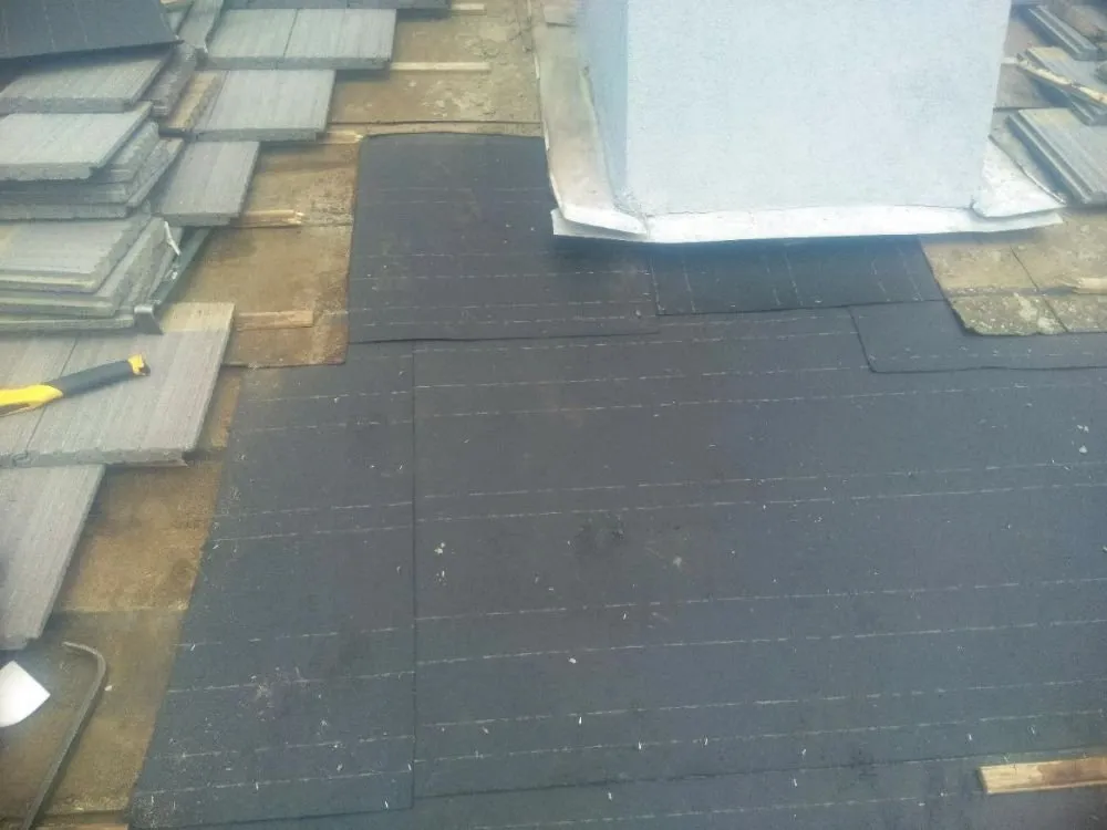 Slide of Earl Bennett Roofing