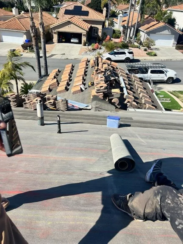 Slide of Early Roofing Rosendo