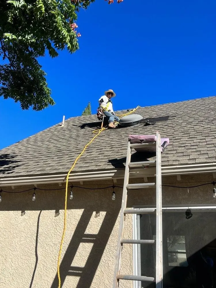 Slide of Early Roofing Rosendo