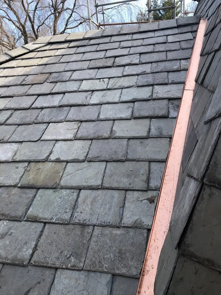 Slide of EarthRise Roofing and Siding