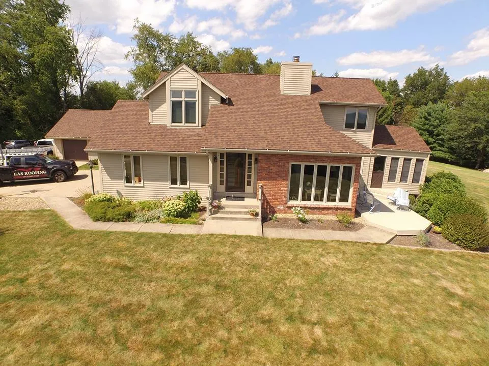 Slide of EAS Roofing