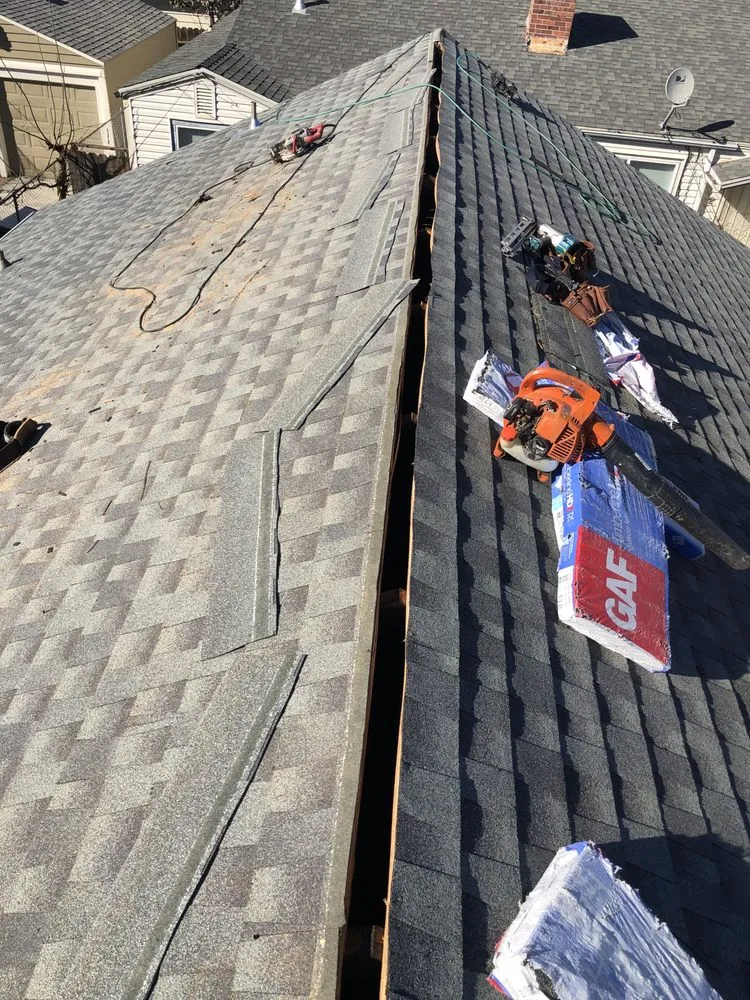 Slide of East Bay Roofing