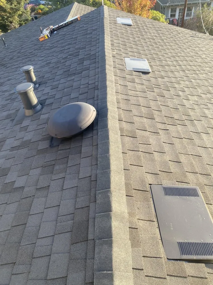 Slide of East Bay Roofing