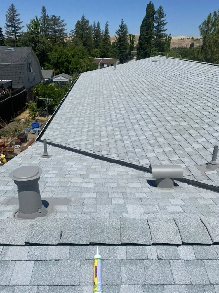 Slide of East Bay Roofing