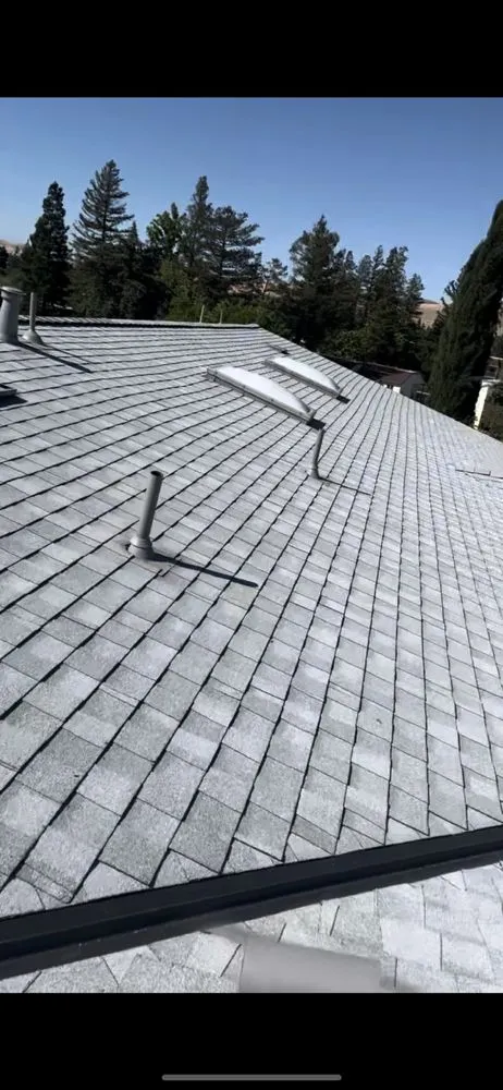 Slide of East Bay Roofing
