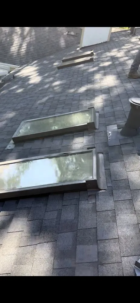 Slide of East Bay Roofing