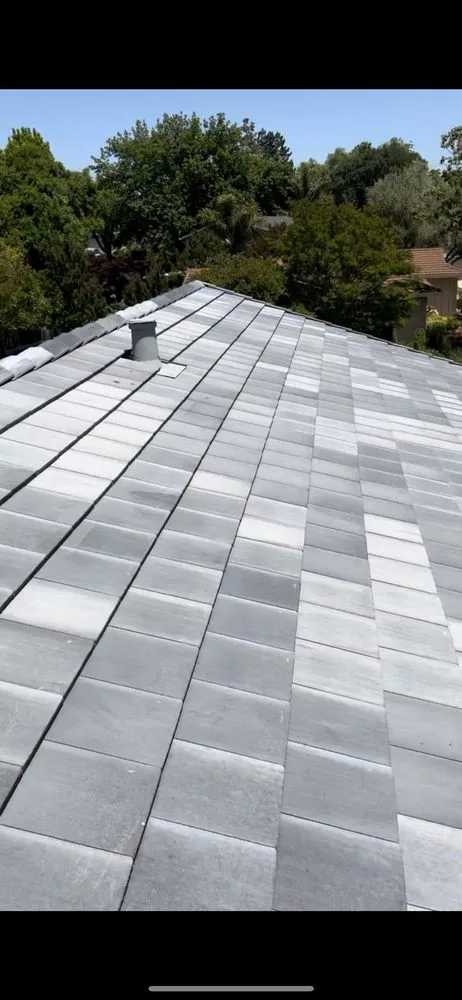 Slide of East Bay Roofing