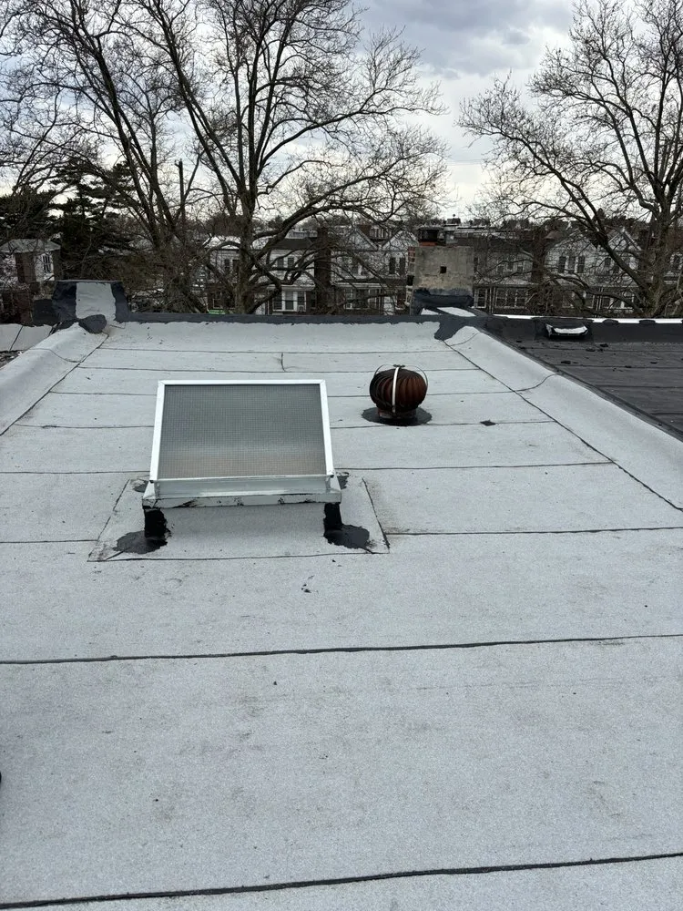 Slide of East Coast Elite Roofing