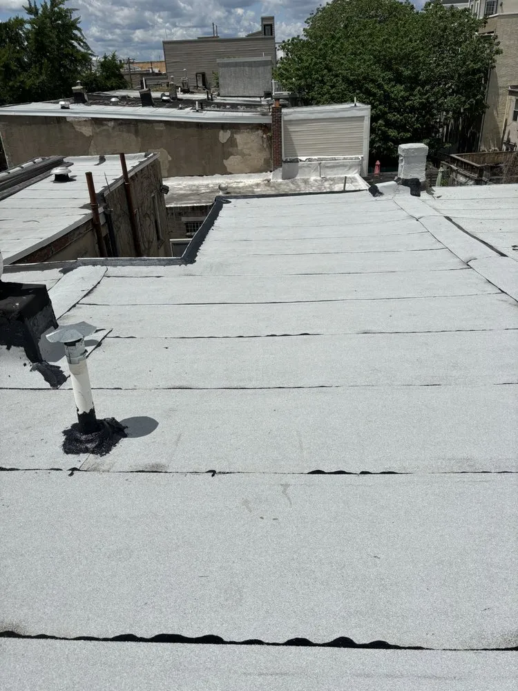 Slide of East Coast Elite Roofing