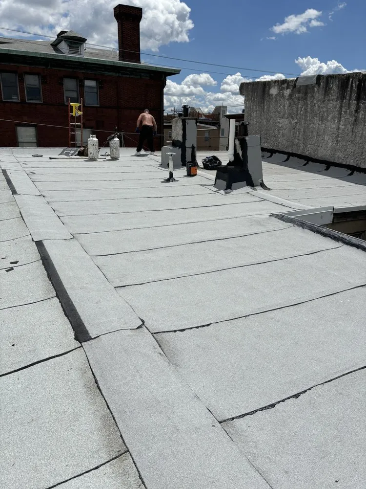 Slide of East Coast Elite Roofing