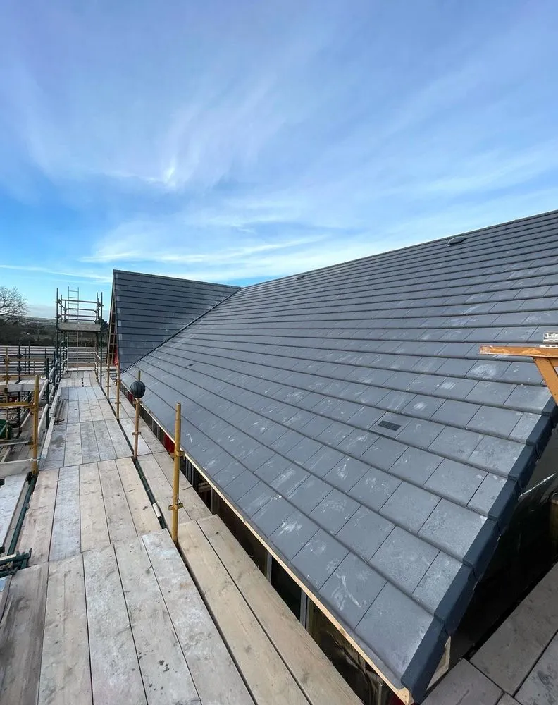 Slide of East Falls Roofing