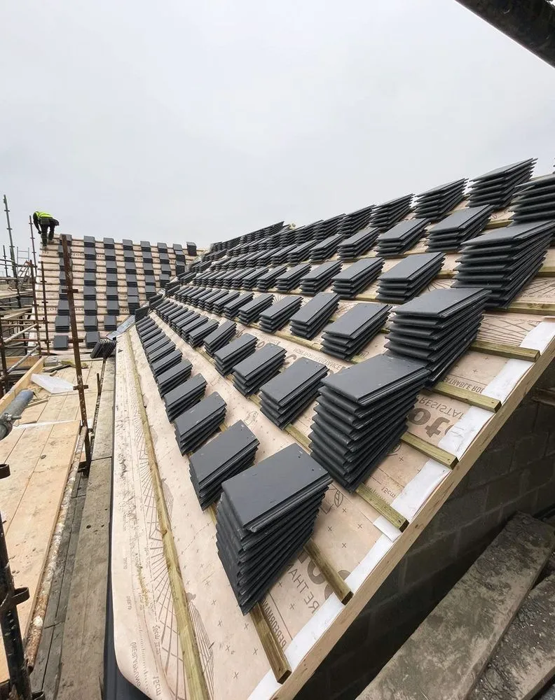 Slide of East Falls Roofing