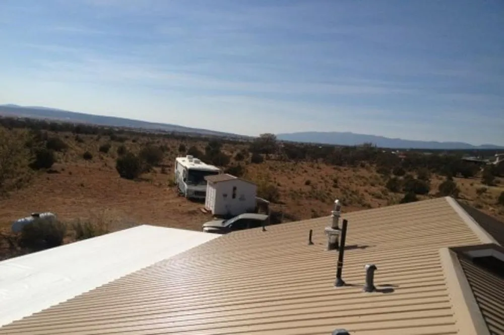 Slide of East Mountain Roofing