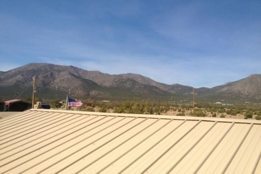Slide of East Mountain Roofing
