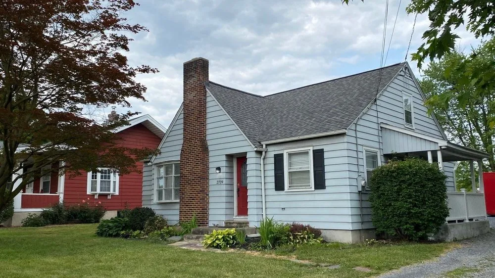 Slide of East Penn Roofing