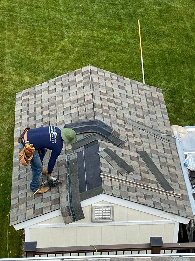 Slide of East Penn Roofing