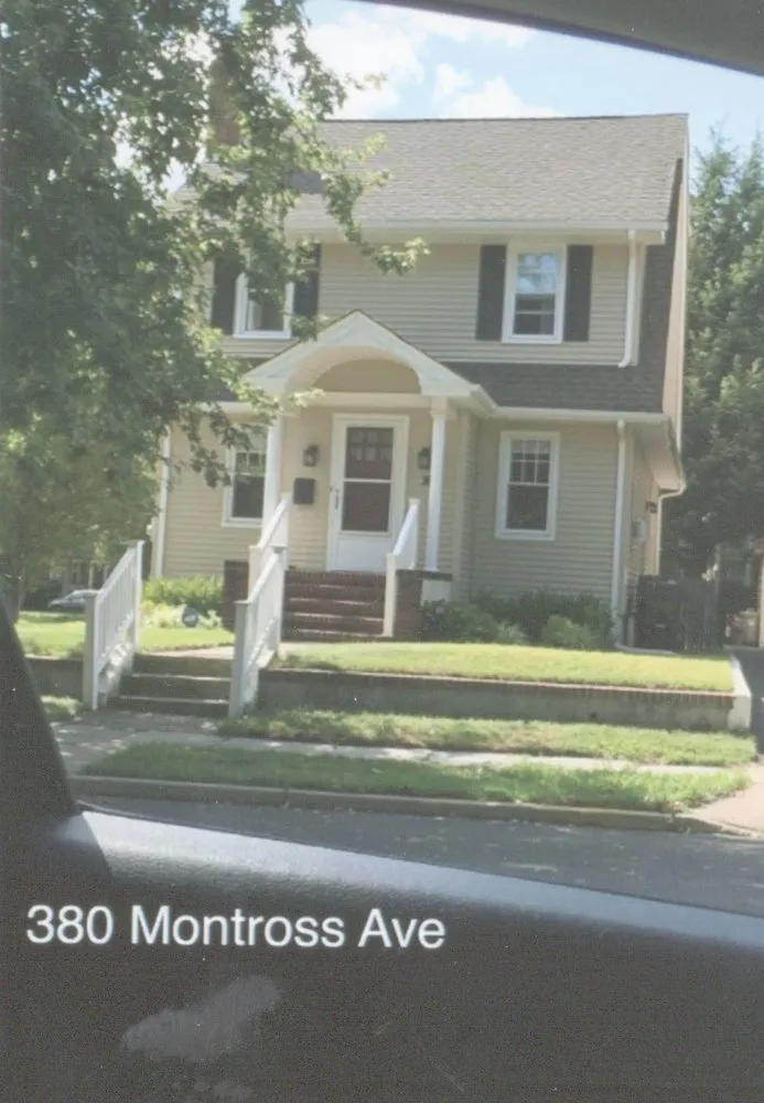 Slide of East Rutherford Roofing