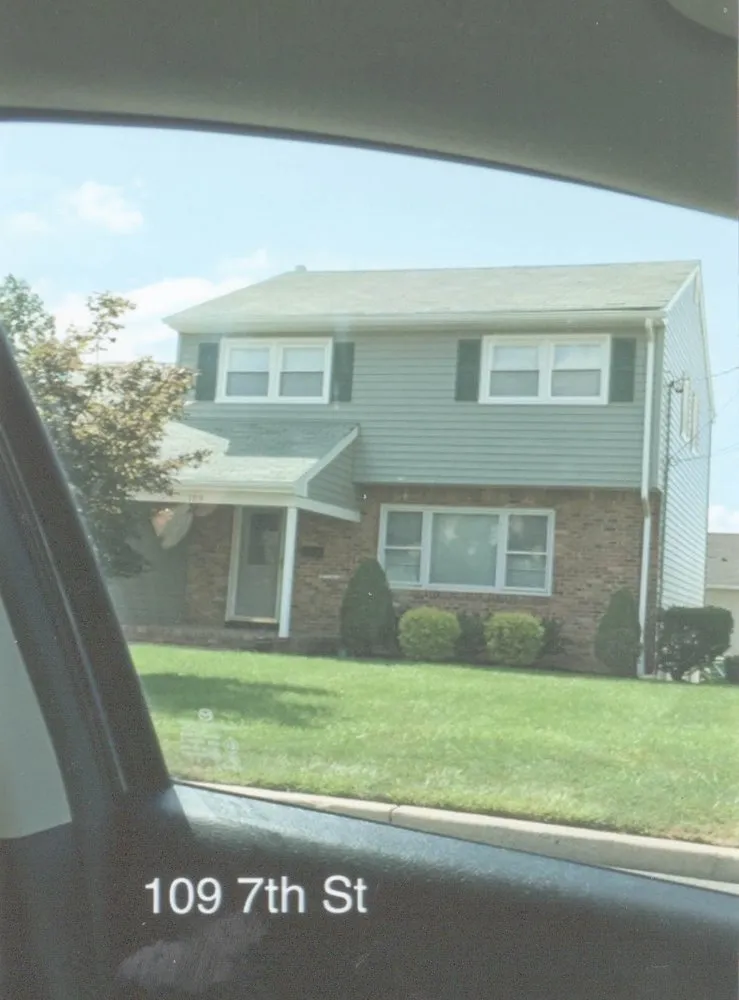 Slide of East Rutherford Roofing