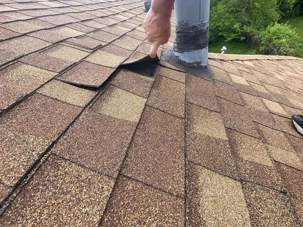 Slide of East Side Roofing