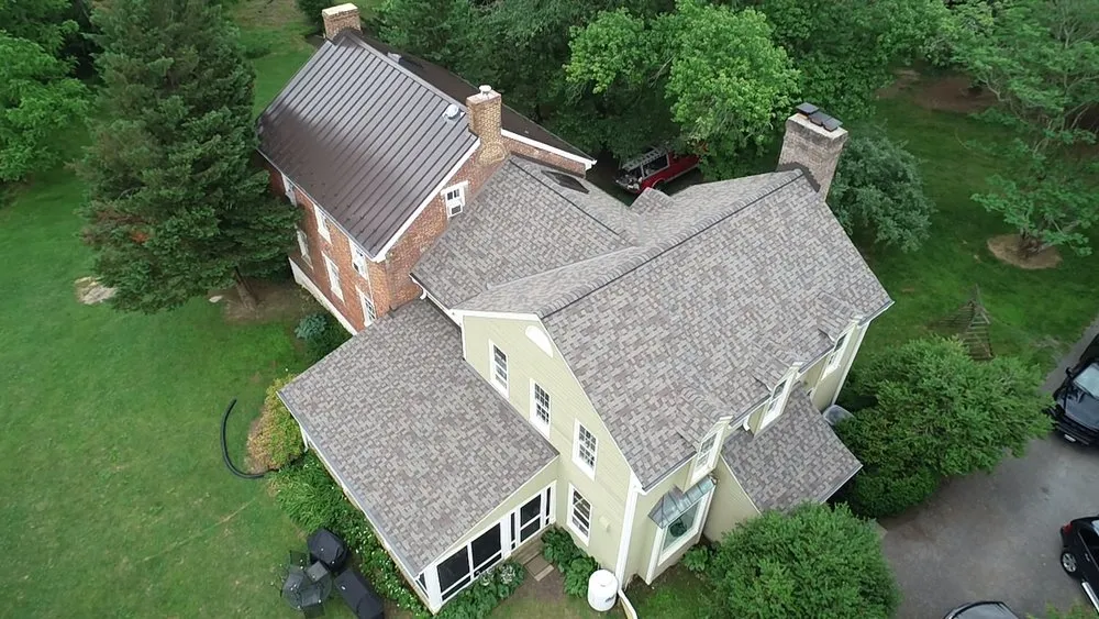 Expert roof replacement after storm damage in Brookeville, MD by East West Contractors