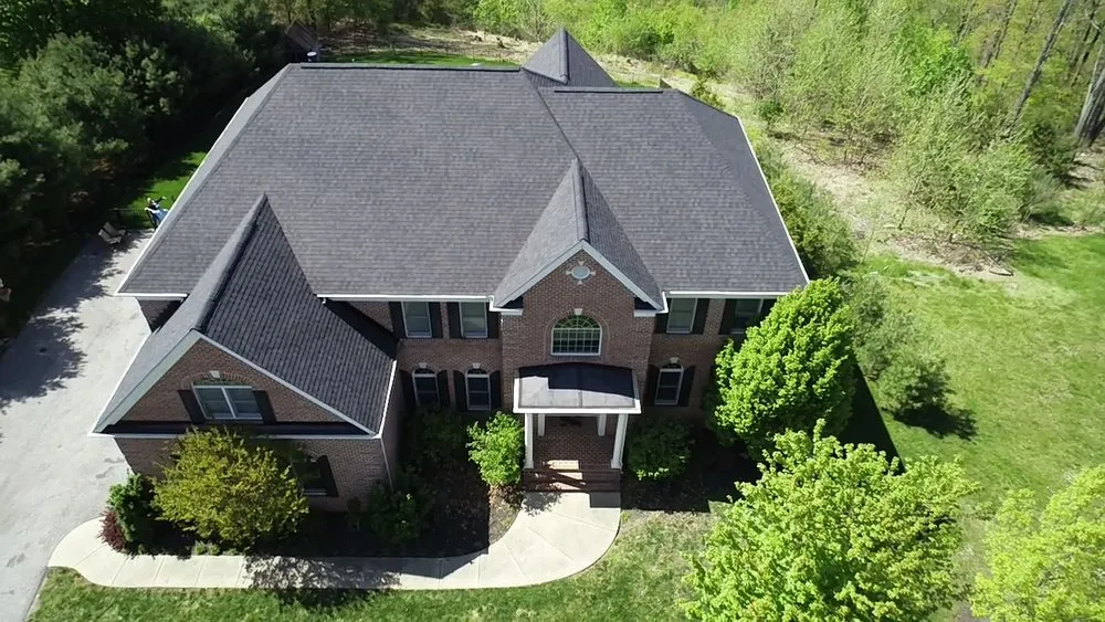Licensed flat roof repair for homes in Brookeville, MD by East West Contractors