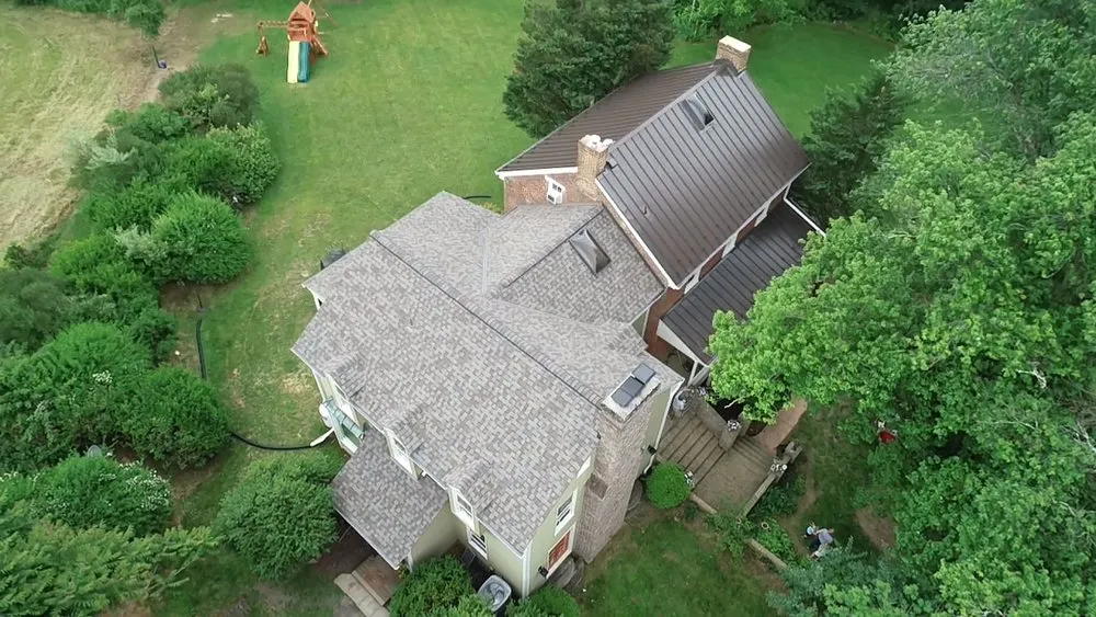Reliable shingle roofing service for residential properties in Brookeville, MD by East West Contractors
