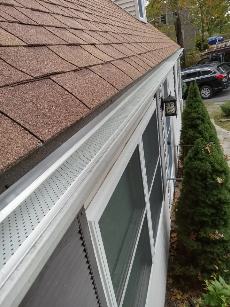 Slide of Eastern Mass Gutter Solutions