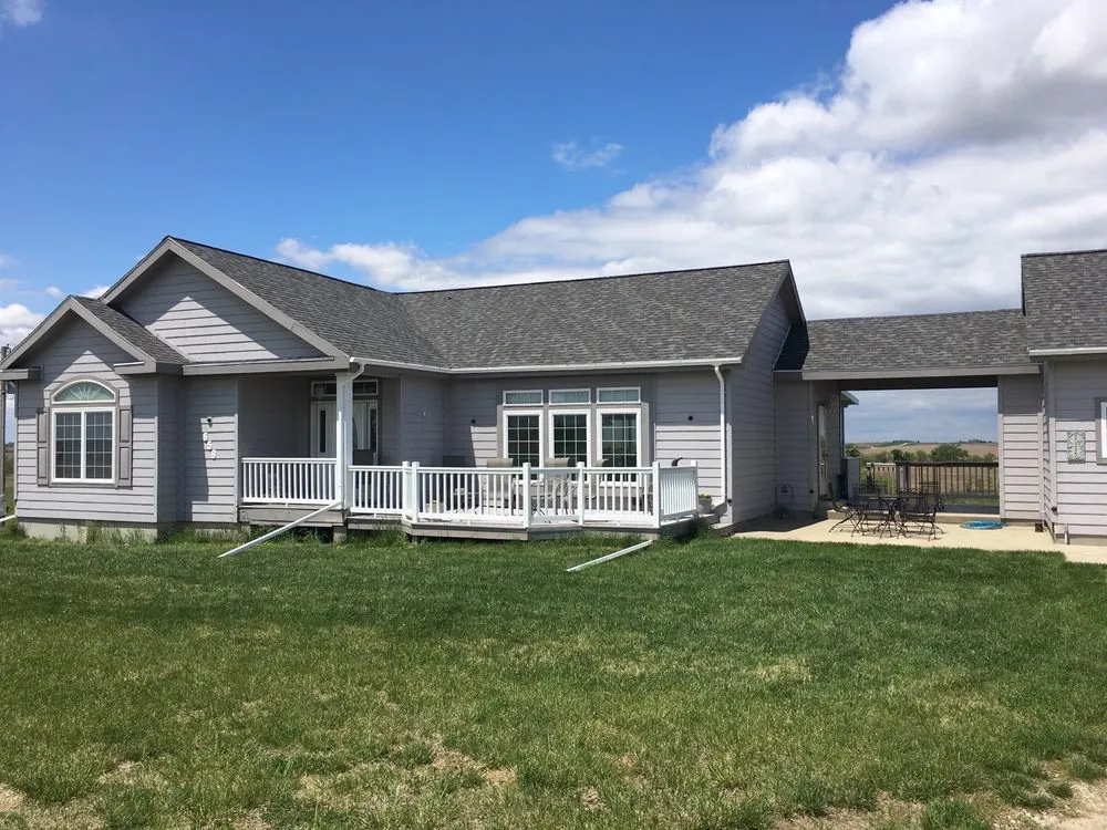 Slide of Eaton Roofing & Exteriors