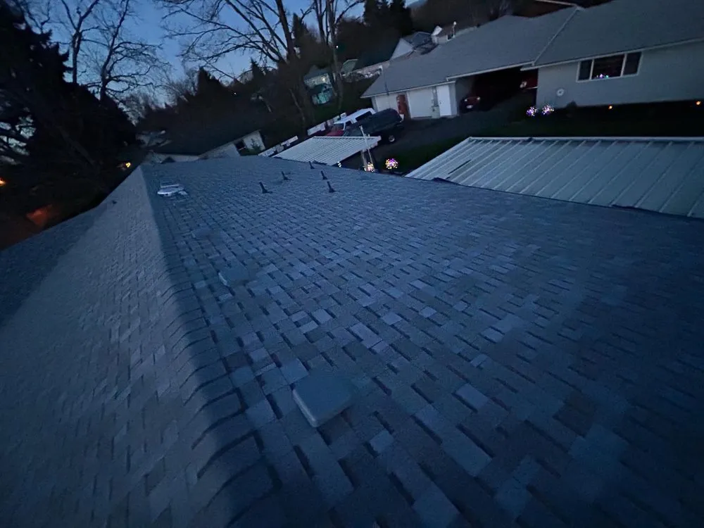 Slide of Eave To Peak Roofing And Construction