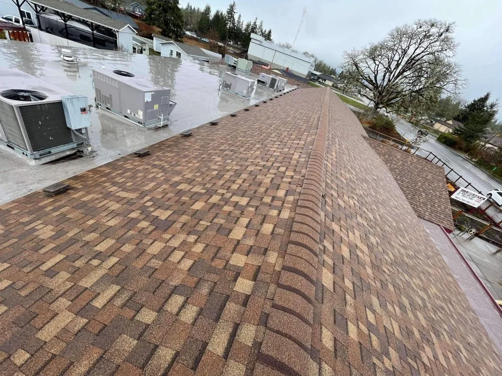 Slide of Eave To Peak Roofing And Construction