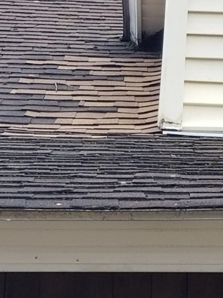 Slide of EAW Roofing and Construction