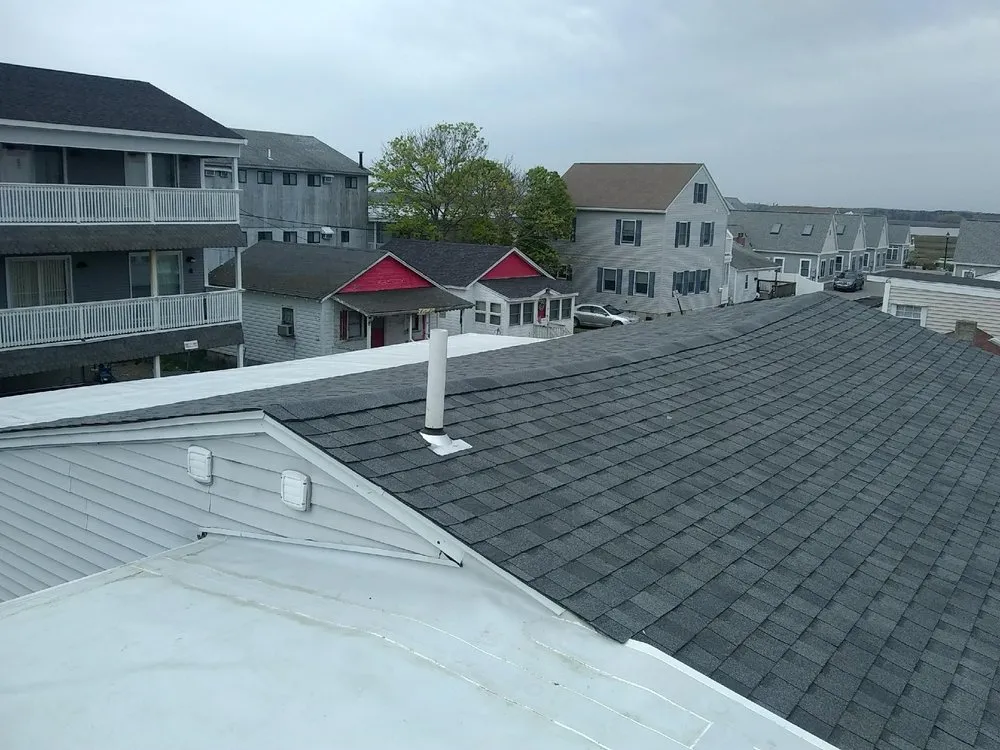 Slide of EAW Roofing and Construction